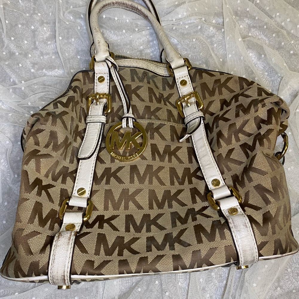 Authentic Michael Kors Hand Bag with Adjustable Sides and Large Moniker Charm